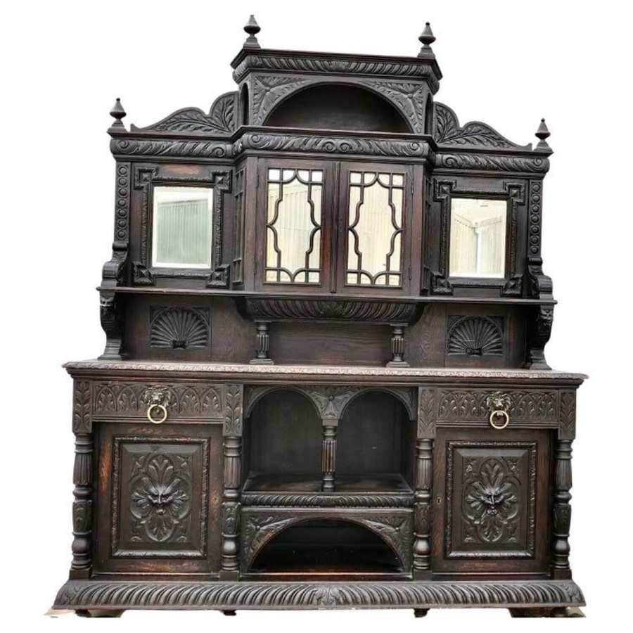 A Very Large Carved Oak Green Man Sideboard
