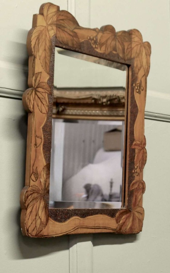 An Arts and Crafts Poker Work Wall Mirror