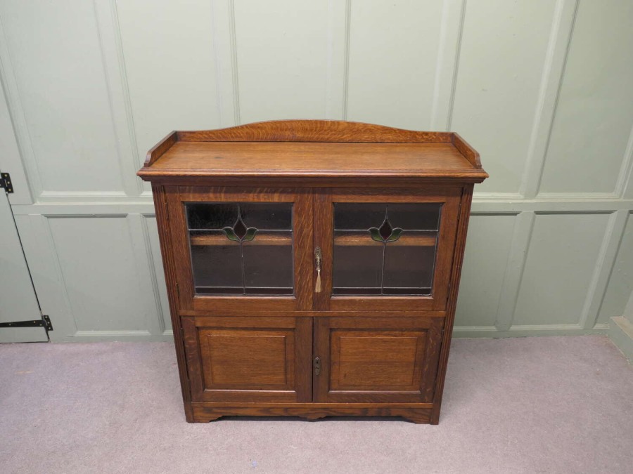 Arts and Crafts Oak Stained Glass Bookcase.