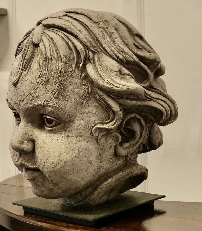 Large Clay Bust of a Child by Philippe Seené, set on Bronze This is an Exquisite Life