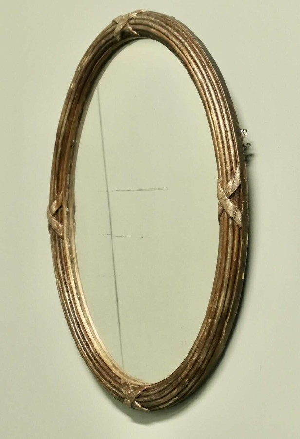 Large Gilt Oval Wall Mirror This Mirror has a 1.5” wide moulded oval frame which has an a