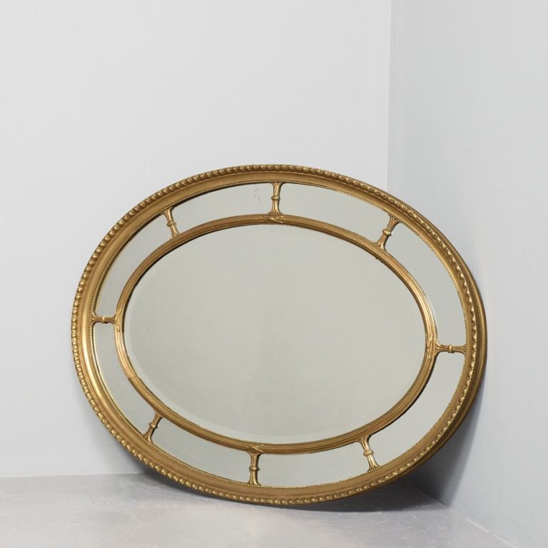 Large Gilded Adam Style Oval Compartmental Mirror