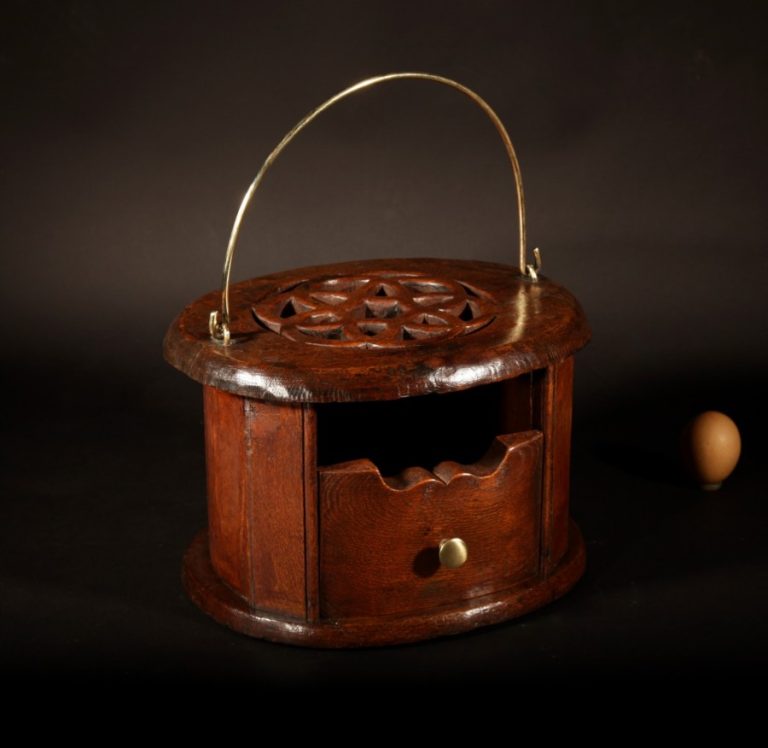 An Oval 19th Century Oak Dutch Foot Stove.