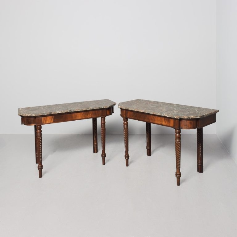 Pair of William 4th mahogany framed, break-front, marble-topped hall or side tables