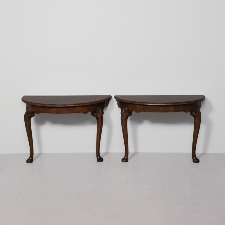 Pair of early Georgian-style figured-walnut demi-lune hall tables