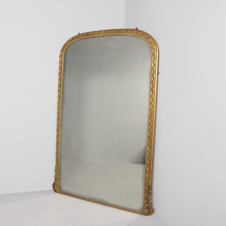 Very large, decorative Victorian gilded arched-top mirror, in exceptional condition