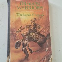 Paperback role-playing game book titled ‘Dragon Warriors: The Lands of Legend’ (Book 6) by Dave Morris