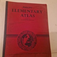Hardcover atlas titled ‘Philips’ Elementary Atlas’ edited by Harold Fullard