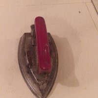 Vintage miniature sad iron with red wooden handle