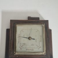 Oak-cased aneroid barometer by Shortland Smiths