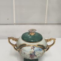 Porcelain music box titled ‘Beauties of the Red Mansion’ by Ardleigh Elliott