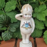 Porcelain ‘Thumbs Up’ figurine with Leeds coat of arms