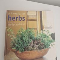 Hardcover book titled ‘A Handful of Herbs’ by Barbara Segall and Louise Pickford