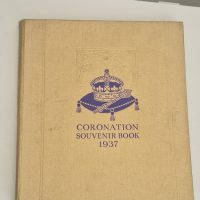 Hardcover book titled ‘Coronation Souvenir Book 1937’ commemorating the coronation of King George VI and Queen Elizabeth
