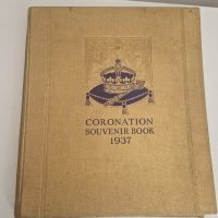 Hardcover book titled ‘Coronation Souvenir Book 1937’ commemorating the coronation of King George VI and Queen Elizabeth