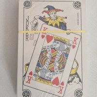Vintage Belgian playing card featuring Joker with King of Hearts