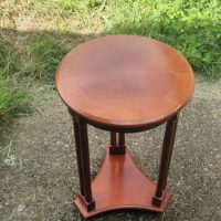 Mahogany round side table with lower shelf