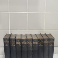 Set of nine vintage hardcover books in dark blue cloth binding