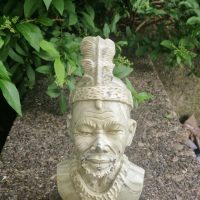 Butter jade stone sculpture depicting a Shona chief or elder by Zimbabwean artist