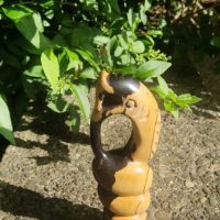 Hand-carved wooden sculpture of Nyami Nyami, the Zambezi River serpent spirit, by Shona artisan