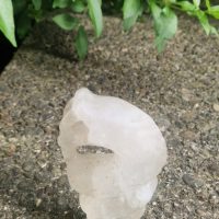 Hand-carved clear quartz sculpture of Nyami Nyami, the Zambezi River serpent spirit, by Shona artisan
