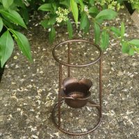 Wrought iron ball-shaped candle holder