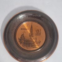Metal decorative plate featuring Brussels landmarks