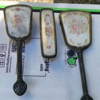 Brass and embroidered vanity set with mirror, brush, and comb