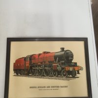 Depicts the iconic crimson-red LMS steam locomotive 5593 Kolhapur