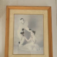 Framed photographic print of ballet dancers in rehearsal or performance pose