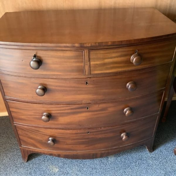 Georgian Bow fronted mahogany chest of two over three drawers