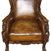 19th Century Carved Oak &amp; Leather Wing Armchair with Figural Detail