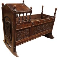 19th Century Carved Oak Rocking Cradle Incorporating Earlier 17th Century Panels
