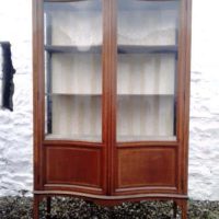 SOLD Large Edwardian mahogany serpentine display cabinet.