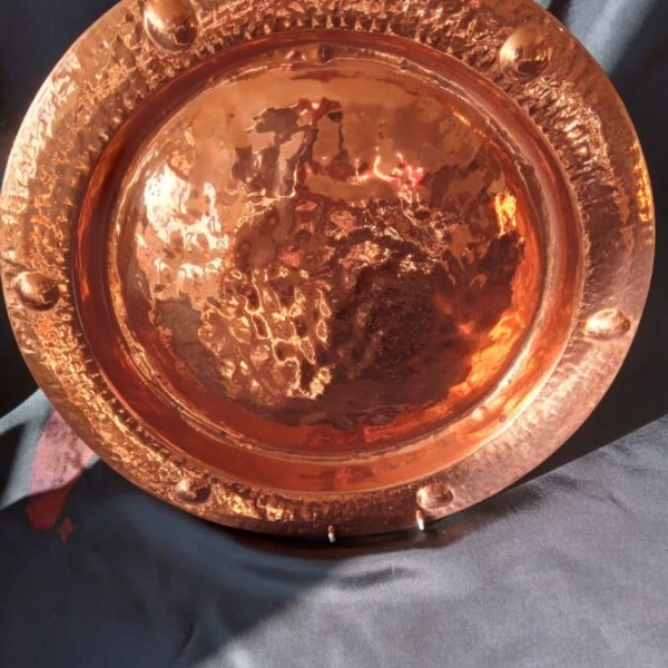 AN ART DECO LARGE COPPER CHARGER