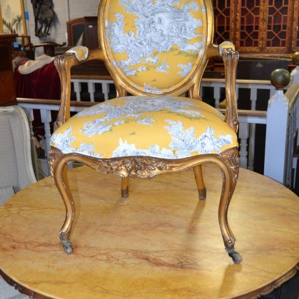 French Gilt Fauteuil upholstered in Gold Toile de Jouy fabric