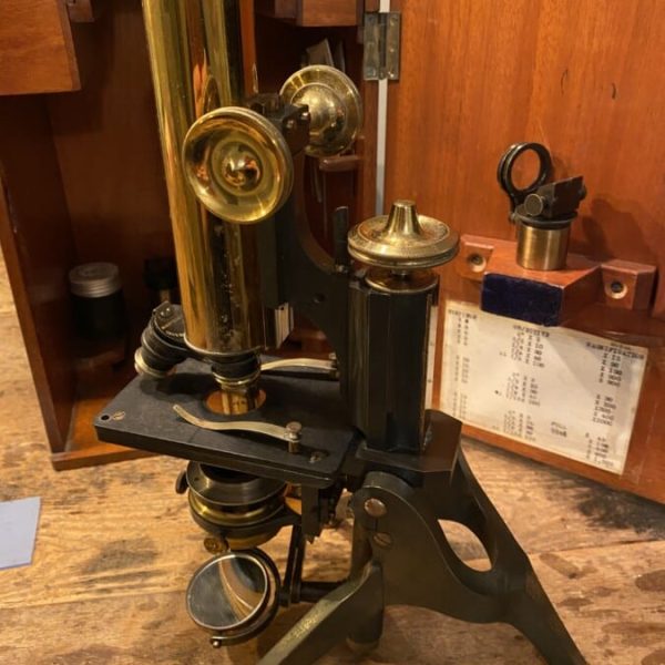 W Watson antique microscope with case and accessories.