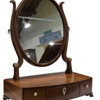 A Georgian Oval mahogany dressing table Mirror