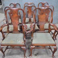 George II set of eight walnut dining chairs