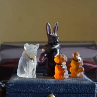 Four small Czech glass charms