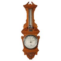 An Edwardian Oak Cased Aneroid Barometer