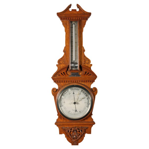An Edwardian Oak Cased Aneroid Barometer