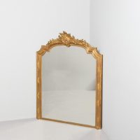 Quality carved giltwood, decorative overmantel mirror retaining its original gold leaf.