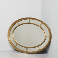 Large Gilded Adam Style Oval Compartmental Mirror