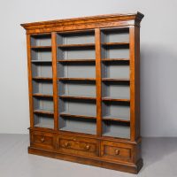 Mid Victorian figured-walnut tall, three-section open bookcase