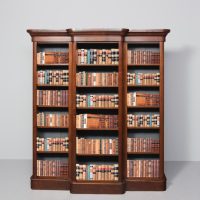 Mid-Victorian breakfront mahogany, three-section open bookcase with clean lines