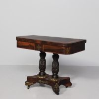 Regency brass and satinwood-inlaid rosewood games table with amazing carved pineapple supports