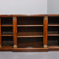 Rare breakfront Regency rosewood open bookcase with gilt decorated pilasters