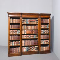 Attractive, Victorian figured-walnut, tall three-section, open bookcase.