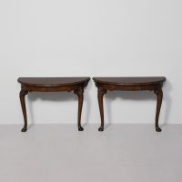 Pair of early Georgian-style figured-walnut demi-lune hall tables